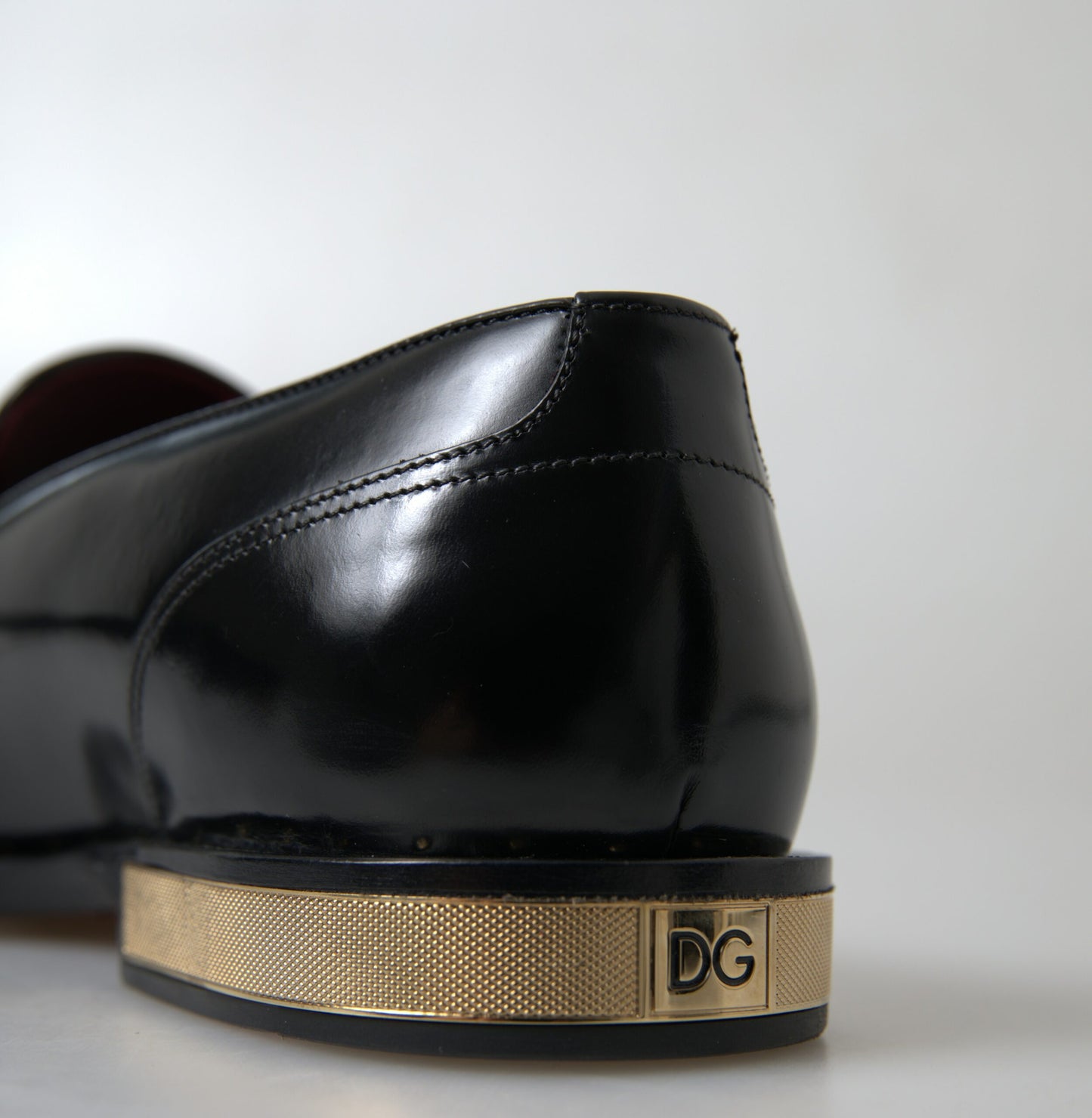 Dolce & Gabbana Elegant Black Gold Tassel Leather Loafers