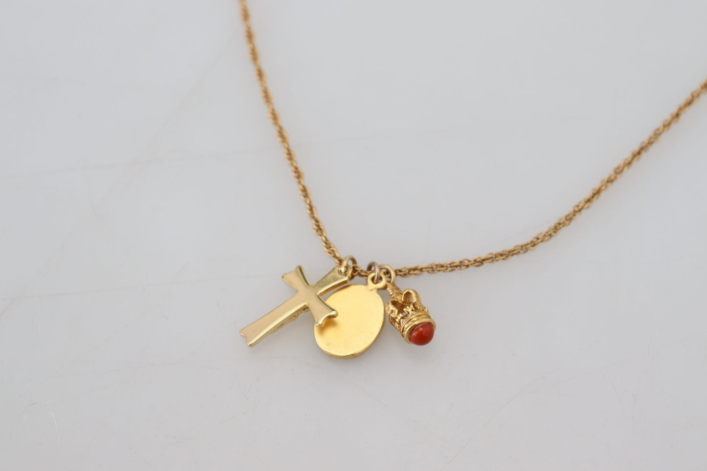 Dolce & Gabbana Elegant Gold Tone Charm Necklace with Cross Pendant