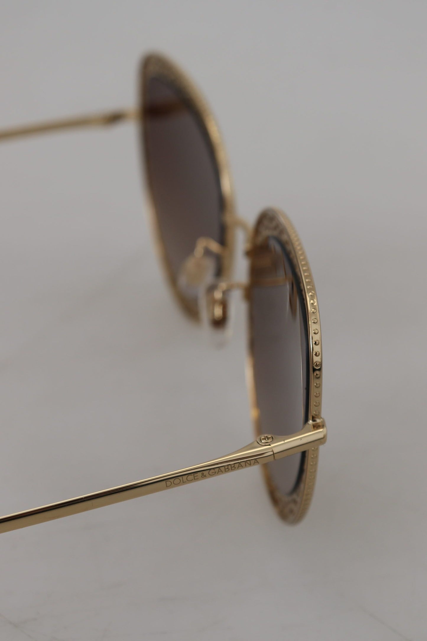 Dolce & Gabbana Elegant Lace-Patterned Gold Sunglasses